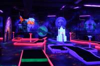 Prague Black Light Mini Golf and Games Tour Including Free Drinks