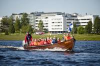 Riverboat and Reindeer Farm Tour from Rovaniemi