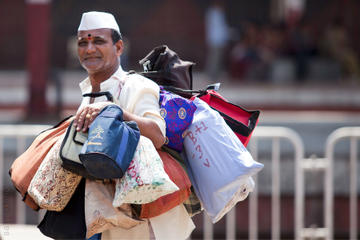 A Morning In The Life of Mumbai's Dabbawalas and Dhobis